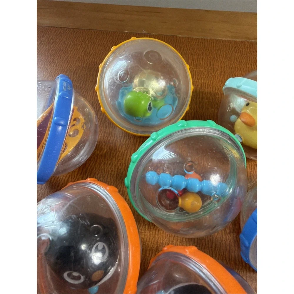 Munchkin Balls Rattles Turtle Penguin Spinner Toys Lot of 9 Baby Bath & Sensory